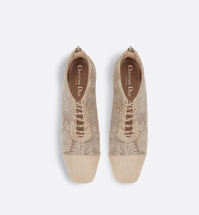 NAUGHTILY-D HEELED ANKLE BOOT